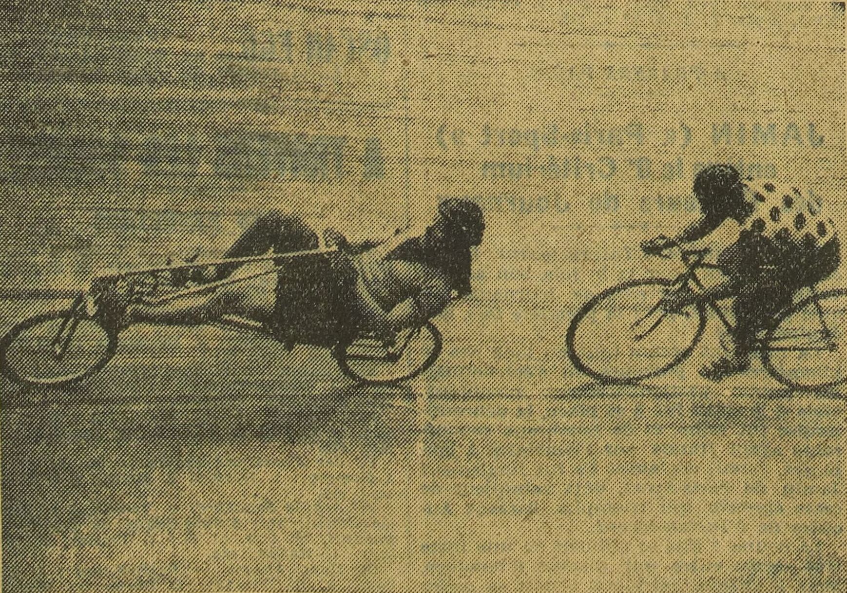 Francis Faure on the Mochet Velocar recumbent leading Henri Lemoine on an upright bicycle at the Vel d'Hiv, 1934
